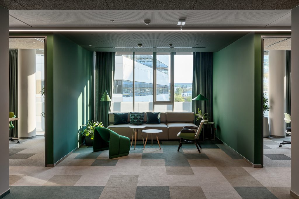 green themed workspace interior area in Nordeus office