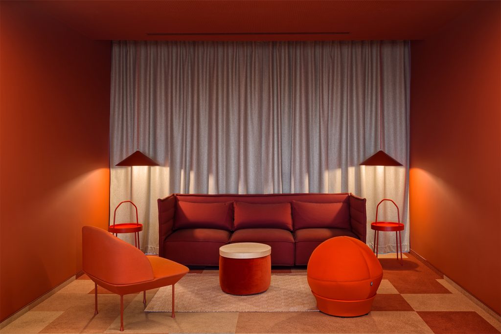 monochromatic red interior space in Nordeus workspace design